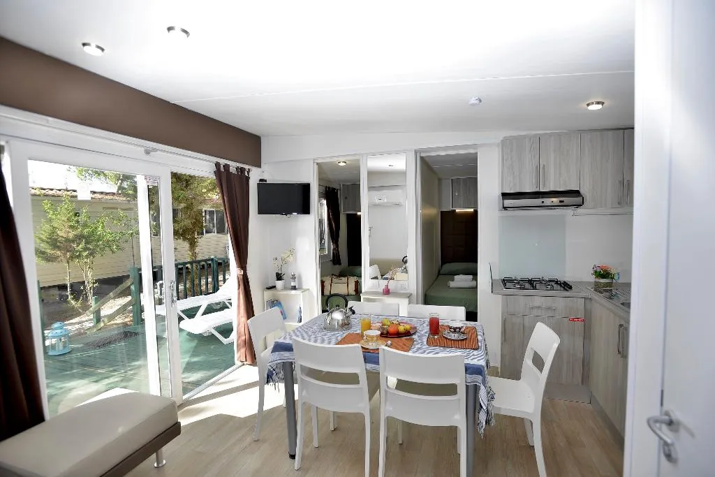 APARTMENT THREE BEDROOMS TWO BATHROOMS Room, Torre Del Porticciolo Camping - Village - Gampling, Alghero