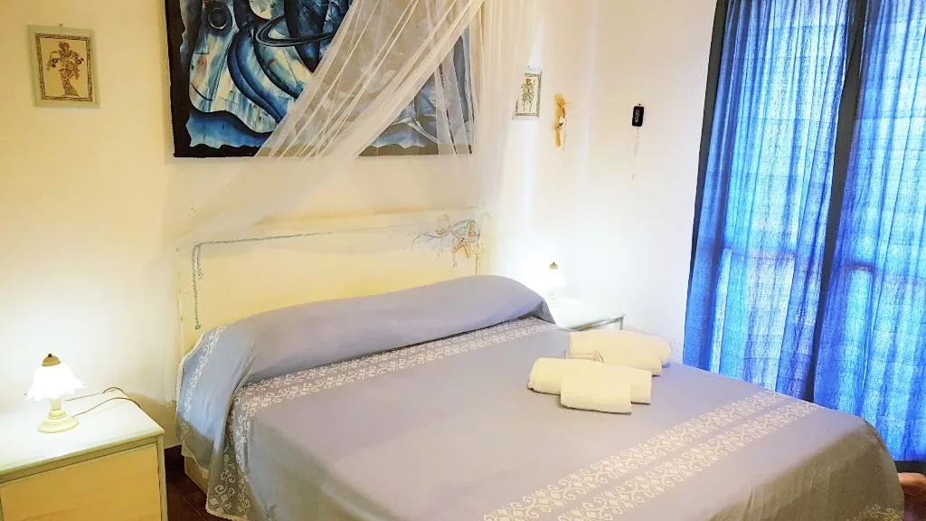 APARTMENT CAPACITY 6 TWO BEDROOMS Room, Villaggio Marineledda, Olbia