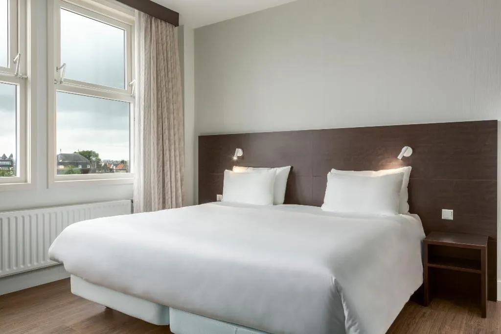 TRIPLE WITH VIEWS Room, NH City Centre Amsterdam, Amsterdam