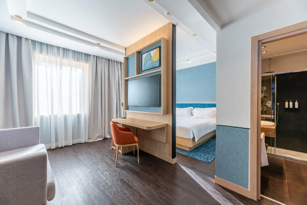 JUNIOR SUITE KING SIZE BED Room, Hilton Garden Inn Rome Colosseum, Rome