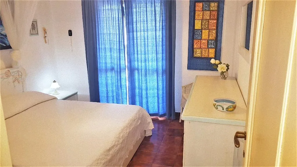 APARTMENT CAPACITY 6 TWO BEDROOMS Room, Villaggio Marineledda, Olbia