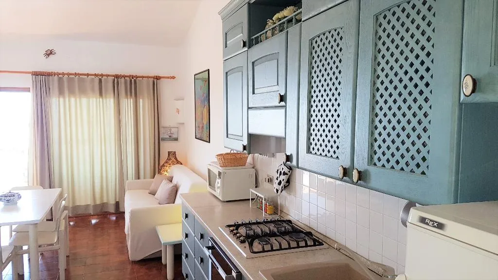 APARTMENT CAPACITY 6 TWO BEDROOMS Room, Villaggio Marineledda, Olbia