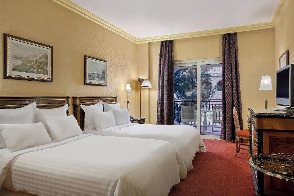 QUADRUPLE TWO QUEEN BEDS Room, Delta Hotels by Marriott Giardini Naxos, Catania