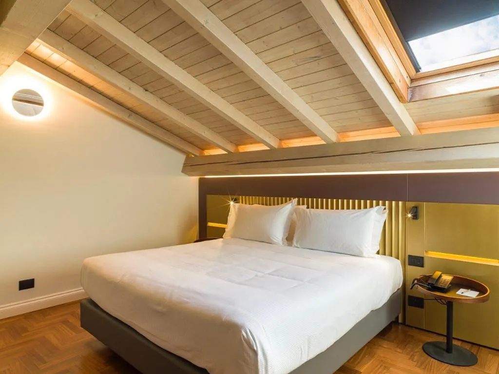 JUNIOR SUITE CAPACITY 4 Room, UNA Hotels One Catania Wellness & SPA, Catania