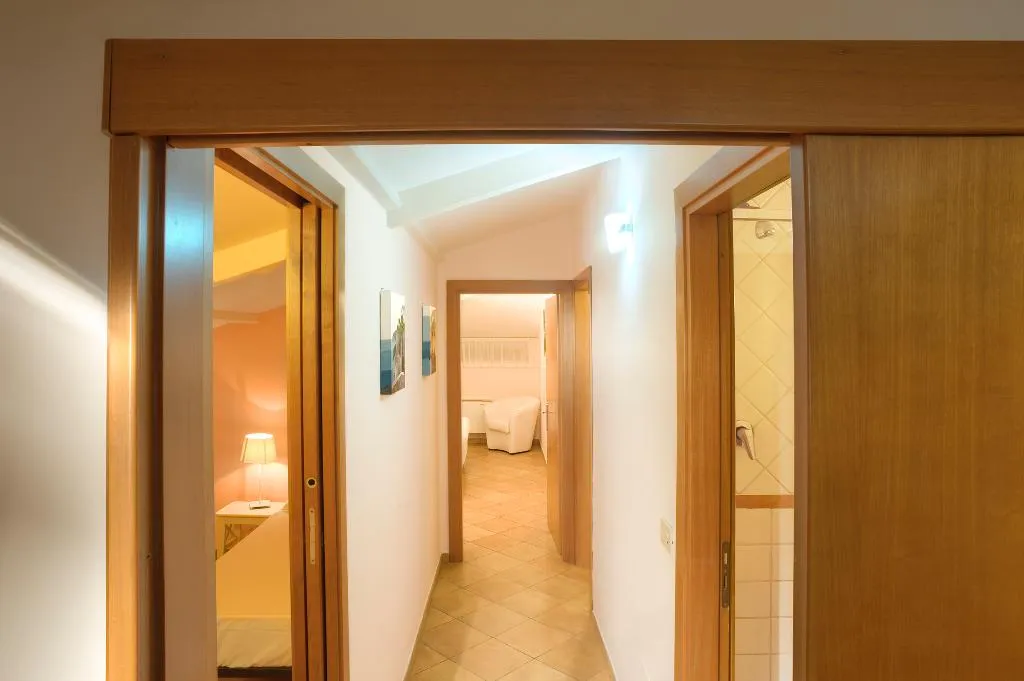 FAMILY ROOM CAPACITY 7 Room, Tasso Suites, Naples