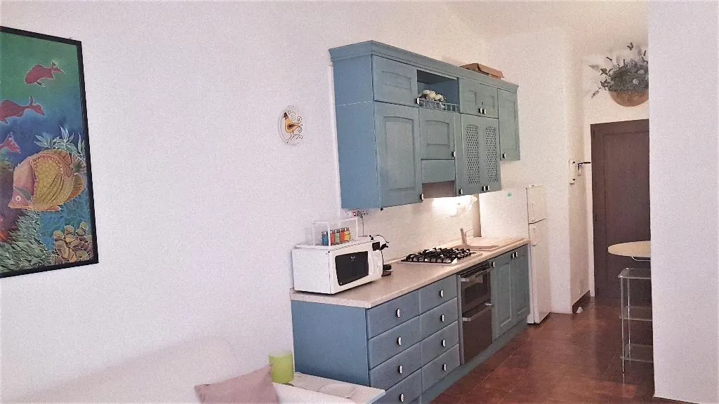 APARTMENT CAPACITY 6 TWO BEDROOMS Room, Villaggio Marineledda, Olbia