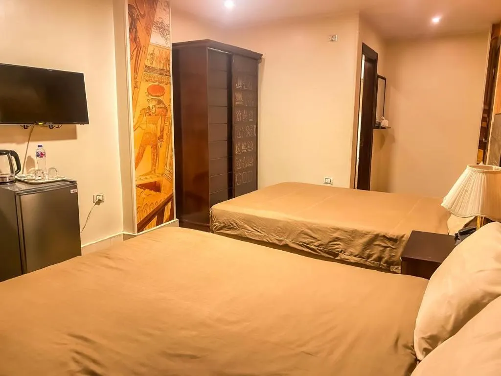 QUADRUPLE DELUXE WITH BALCONY Room, Giza Pyramids Inn, Cairo