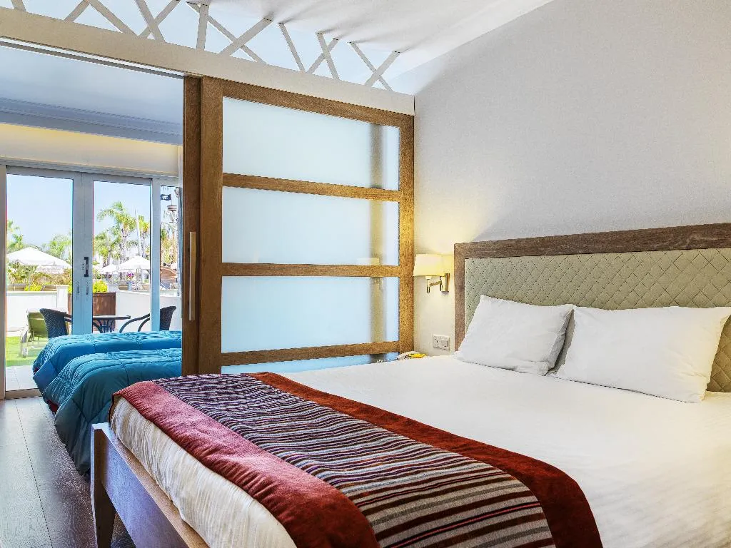 JUNIOR SUITE POOL VIEW Room, Olympic Lagoon Resort, Cyprus