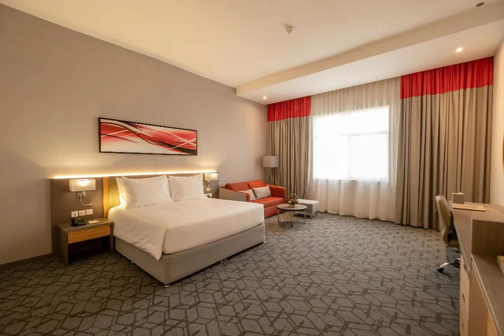 JUNIOR SUITE ONE BED Room, Peony Hotel Dubai, Dubai