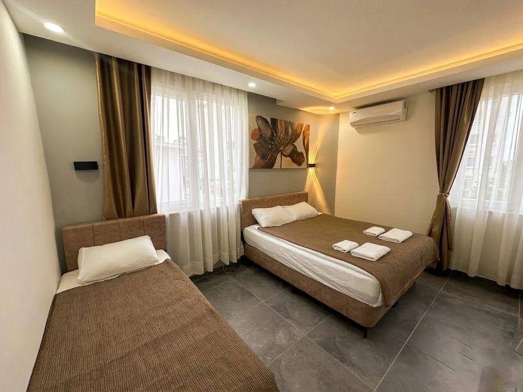 TRIPLE TWO DOUBLE BEDS Room, Babil Hotel, Antalya