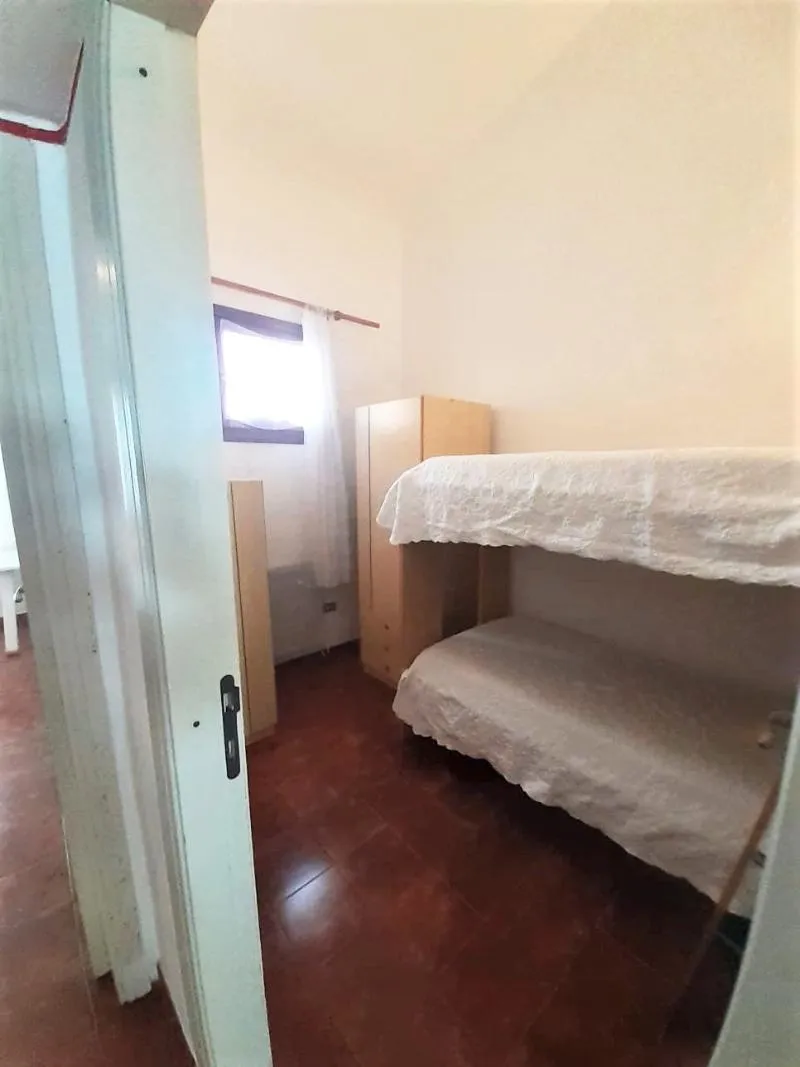 APARTMENT CAPACITY 6 TWO BEDROOMS Room, Villaggio Marineledda, Olbia