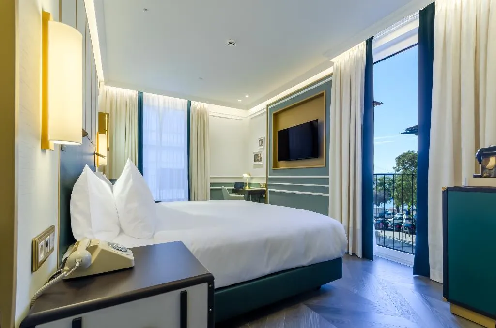 DOUBLE PREMIUM KING BED Room, The Emerald House Lisbon, Curio Collection by Hilt, Lisbon