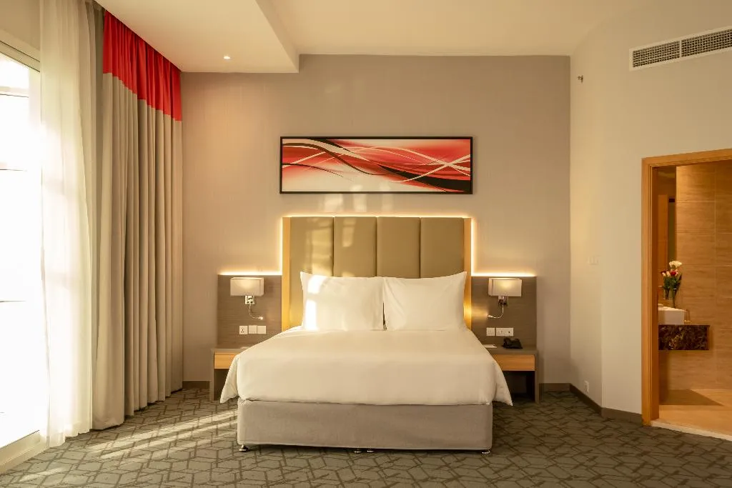 JUNIOR SUITE ONE BED Room, Peony Hotel Dubai, Dubai