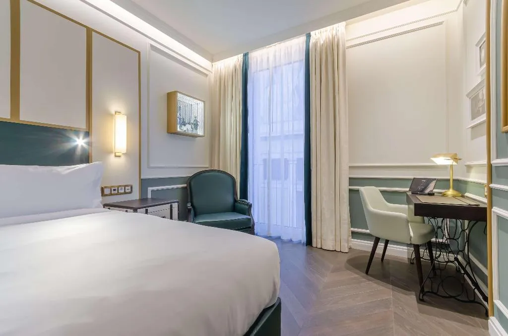 DOUBLE PREMIUM KING BED Room, The Emerald House Lisbon, Curio Collection by Hilt, Lisbon
