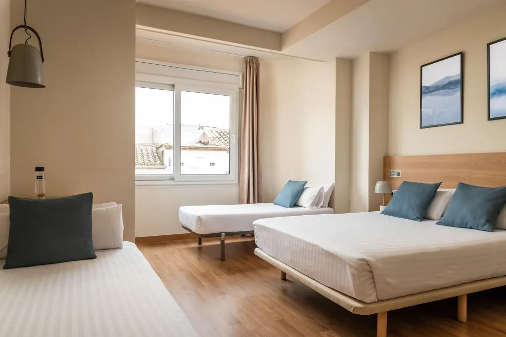 QUADRUPLE TWO DOUBLE BEDS Room, Erba By Pillow, Costa Brava