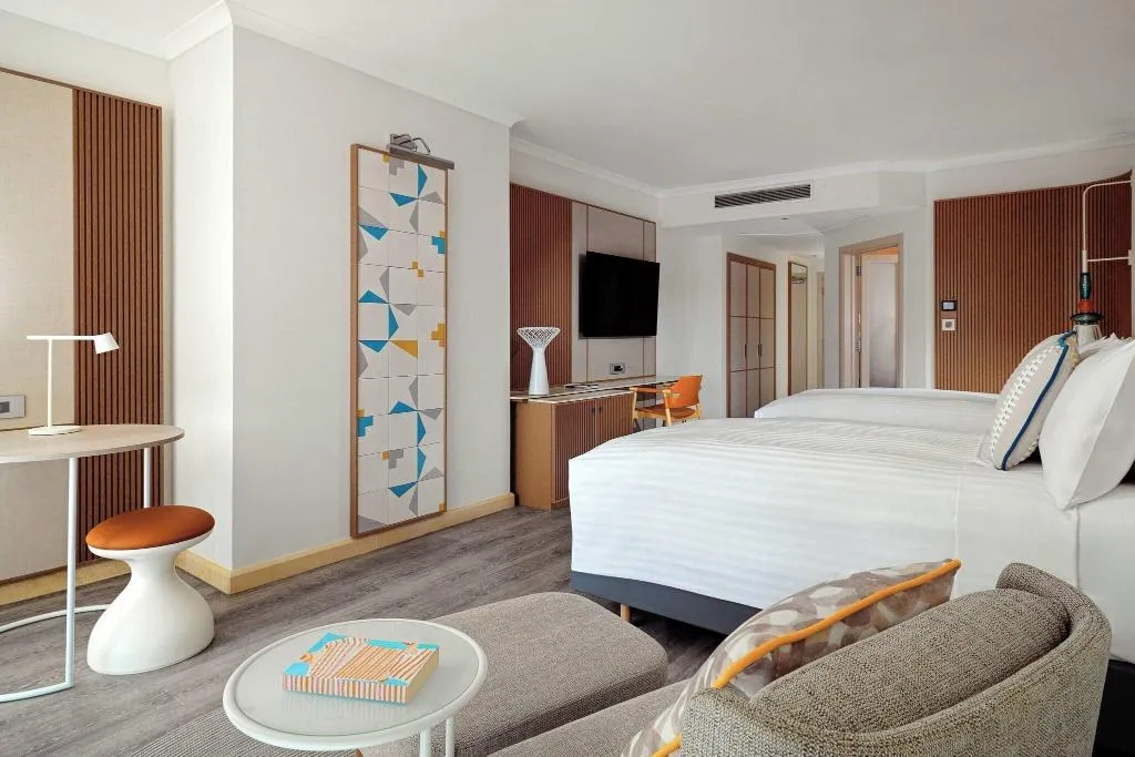 QUADRUPLE DELUXE POOL VIEW Room, Marriott Malta Hotel & Spa, Malta