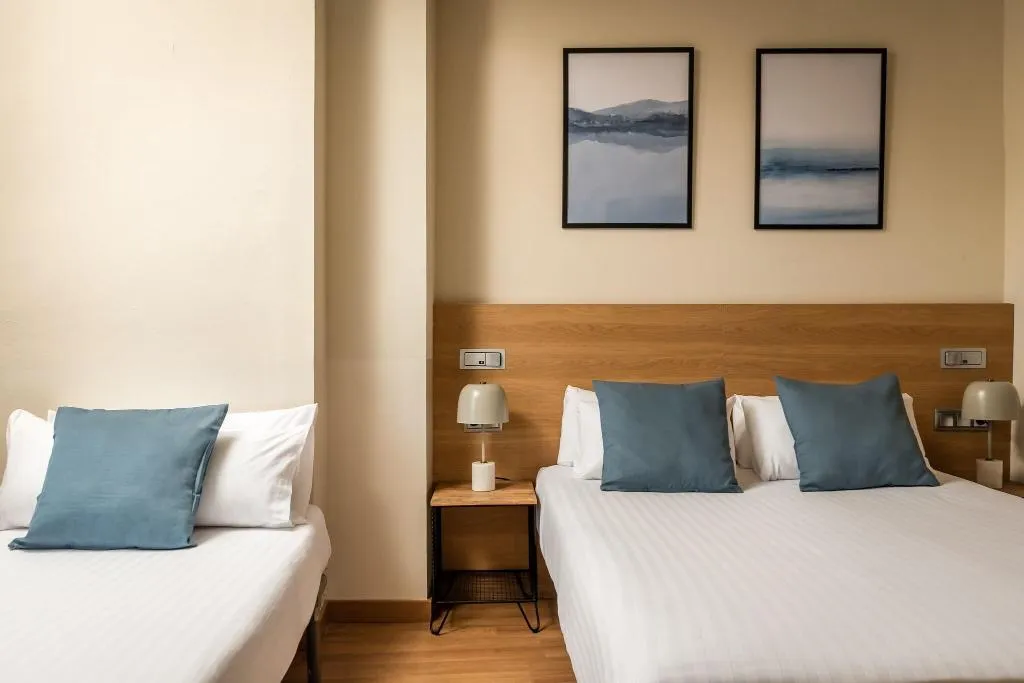 QUADRUPLE TWO DOUBLE BEDS Room, Erba By Pillow, Costa Brava