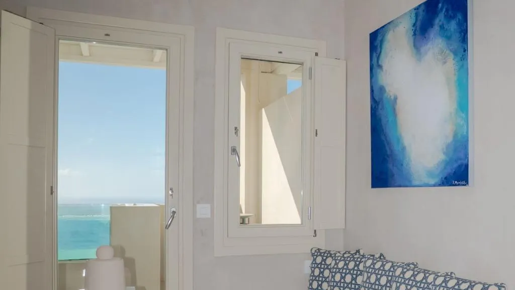 TRIPLE DELUXE SEA VIEW WITH BALCONY Room, Apeiron Blue Santorini - Apeiron Hotels, Santorini