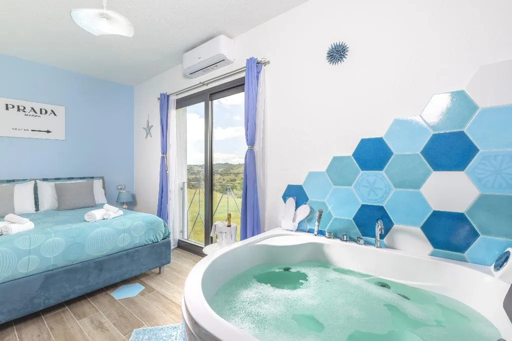 JUNIOR SUITE DELUXE ONE BED Room, Agua Dorada Boutique, Olbia