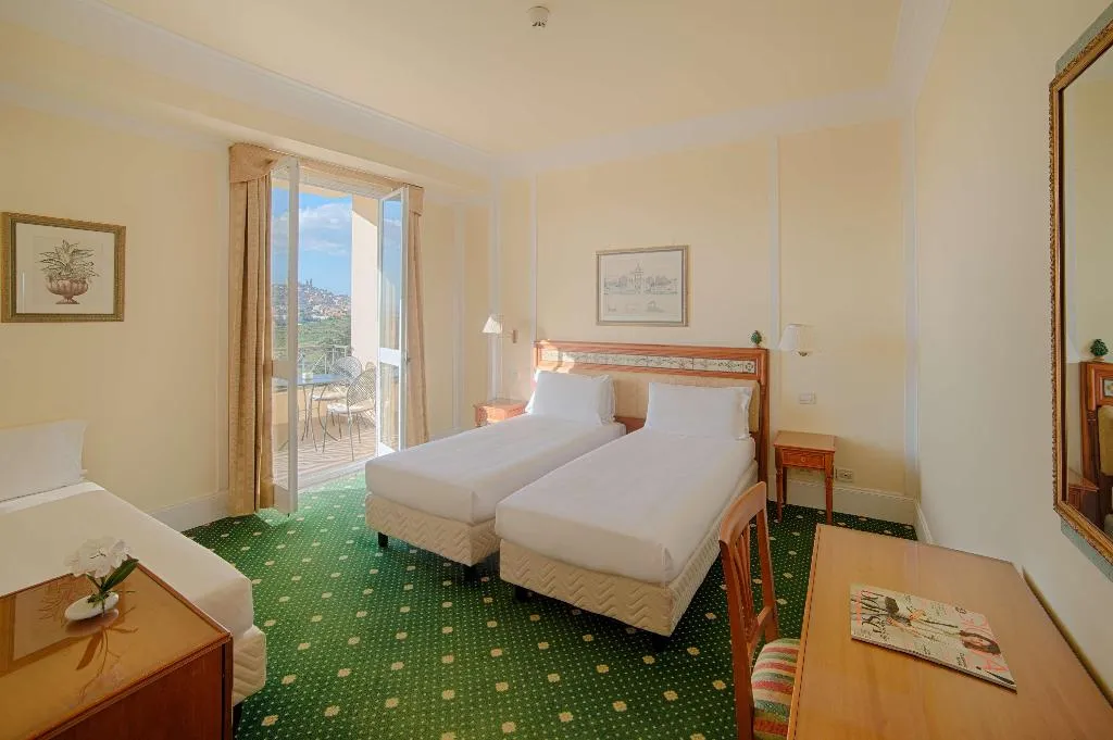 FAMILY ROOM WITH TERRACE Room, NH Caltagirone Villa San Mauro, Catania