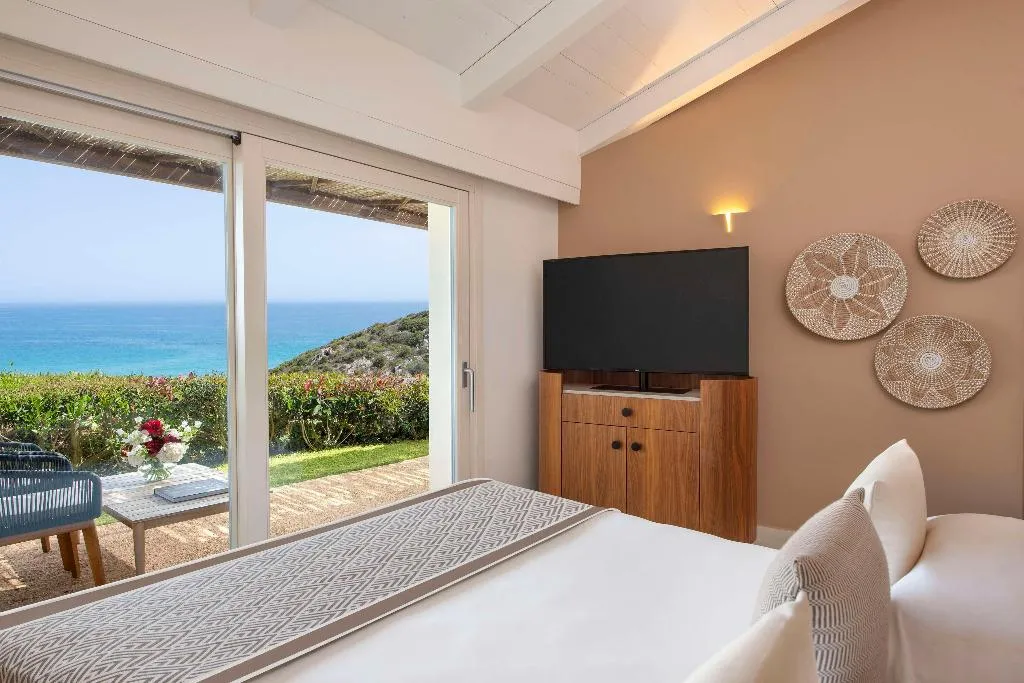 DOUBLE DELUXE SEA VIEW Room, Baia di Chia Resort Sardinia, Curio Collection, Cagliari
