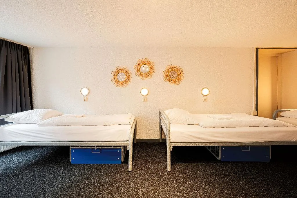 Bed in dormitory STANDARD Room, St. Christopher's at the Winston, Amsterdam