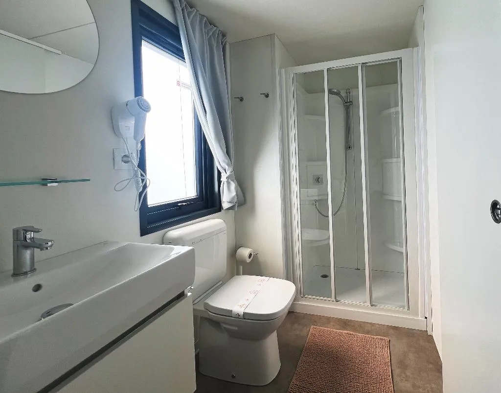 MOBILE HOME TWO BEDROOMS ONE BATHROOM Room, Camping Village Capo D'Orso, Olbia