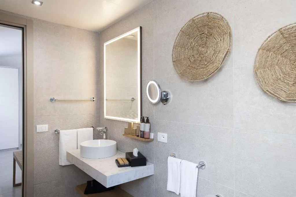 SUITE KING BED ONE BEDROOM  Room, Mangia's Santa Teresa Sardinia, Curio Collection, Olbia