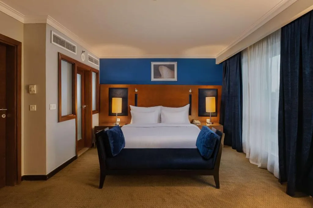 SUITE KING SIZE BED Room, Radisson Blu Cairo Heliopolis, Cairo
