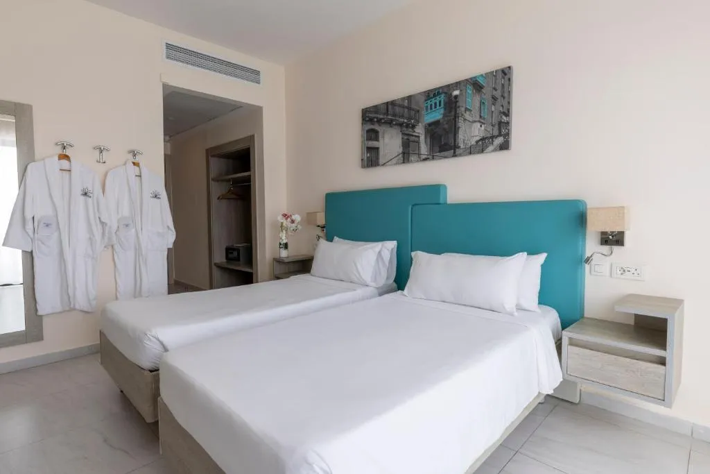 FAMILY ROOM POOL VIEW Room, Riviera Spa Resort – Adults Only, Malta