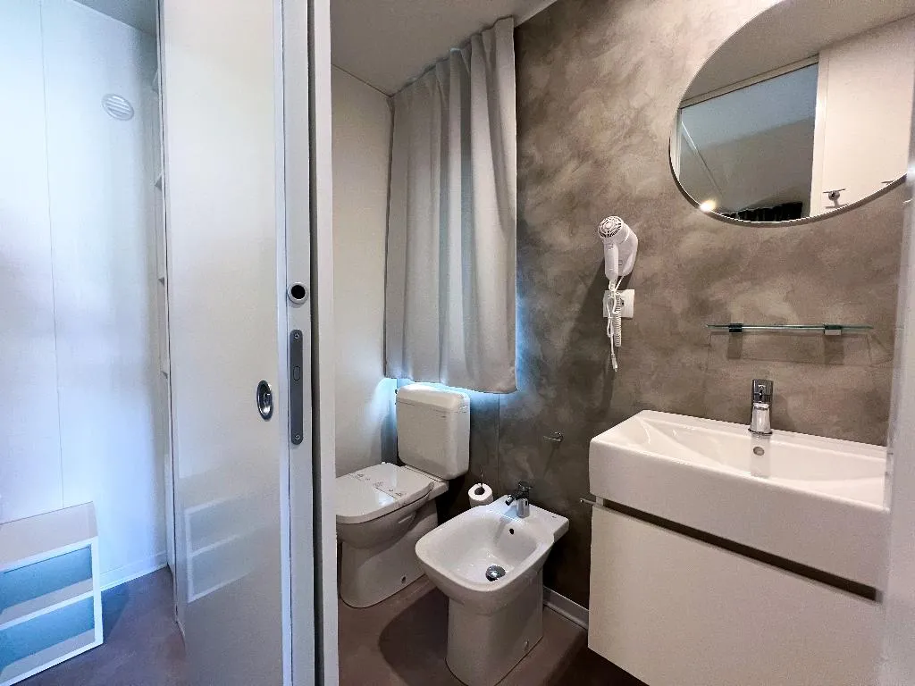 CHALET TWO BEDROOMS TWO BATHROOMS Room, Camping Village Capo D'Orso, Olbia