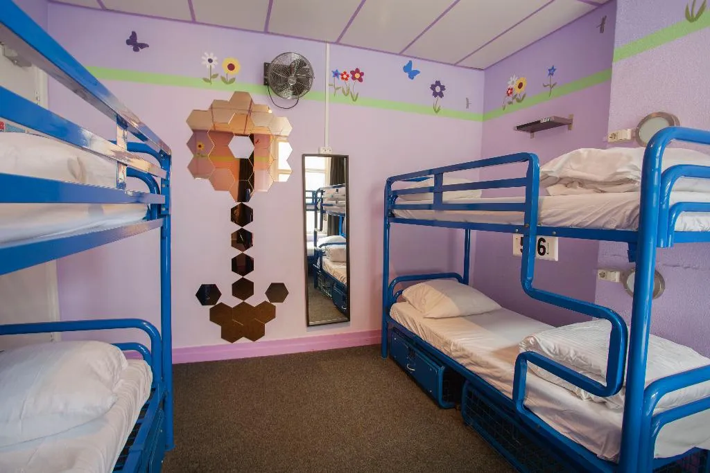 Bed in dormitory FEMALE ROOM CAPACITY 8 Room, Flying Pigs Uptown Hostel Amsterdam, Amsterdam