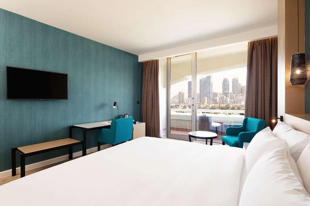 Double or Twin DELUXE CITY VIEW Room, Occidental Sharjah Grand, Dubai