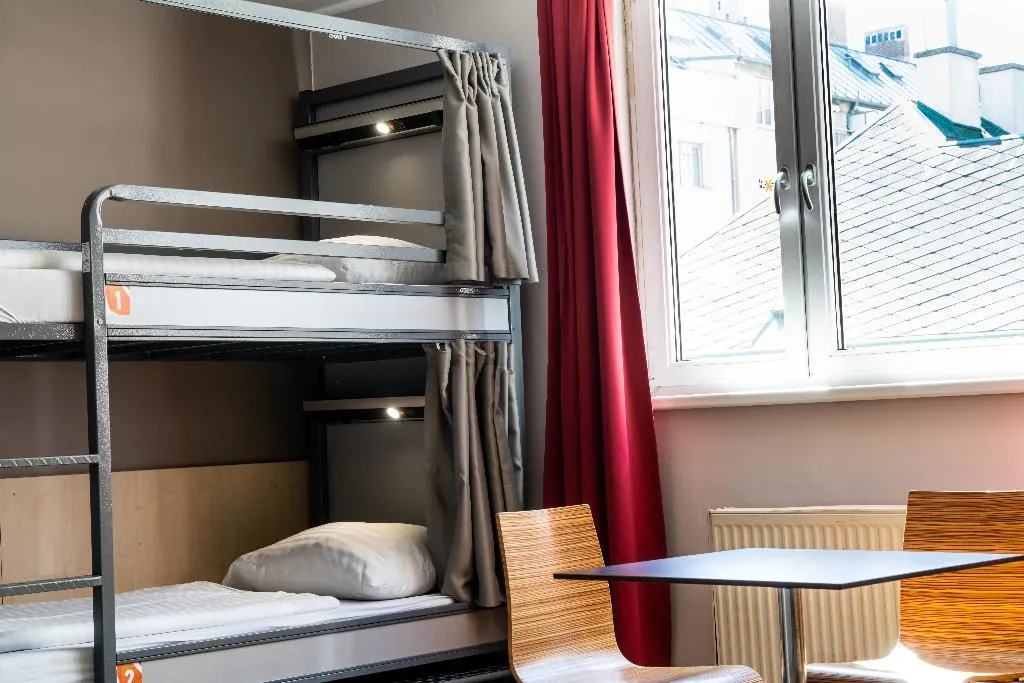 Bed in dormitory FEMALE ROOM Room, St. Christopher's Inn Vienna, Vienna