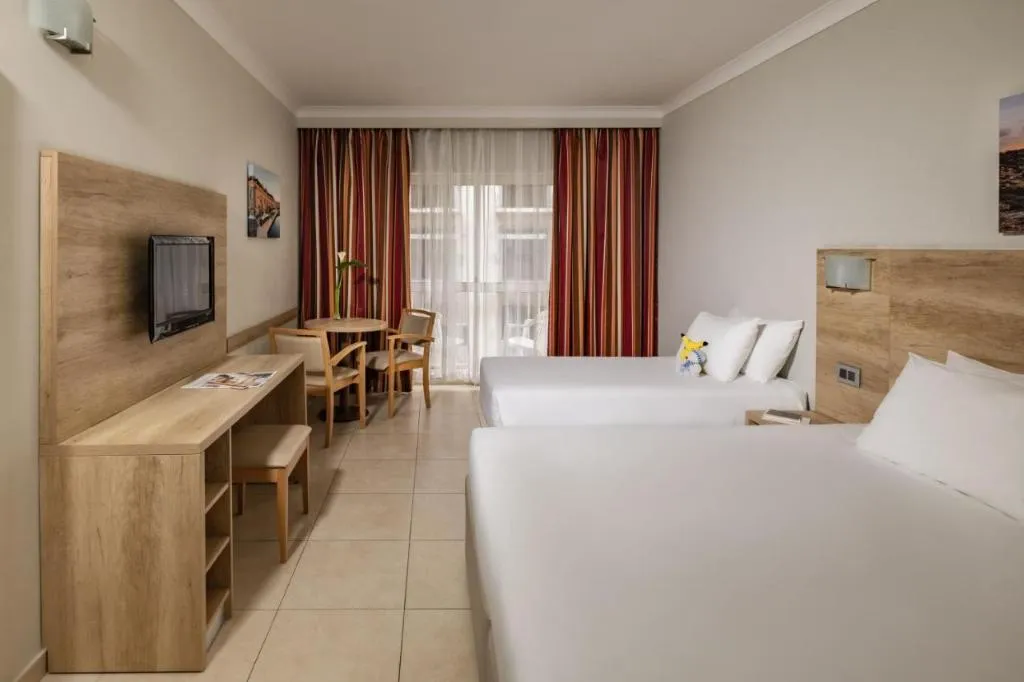 Double or Twin SIDE SEA VIEW Room, QAWRA Palace Resort & SPA, Malta