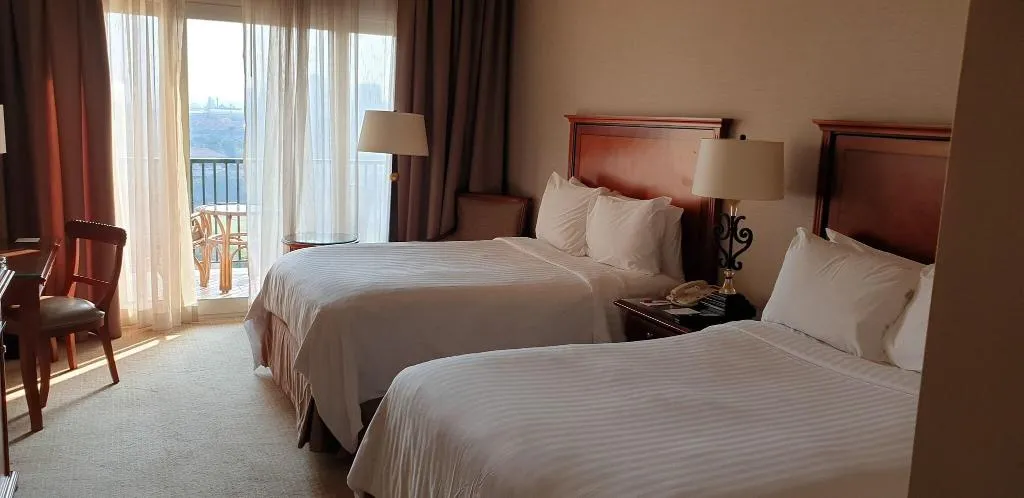 QUADRUPLE DELUXE TWO DOUBLE BEDS Room, Cairo Marriott hotel & Omar Khayyam Casino, Cairo