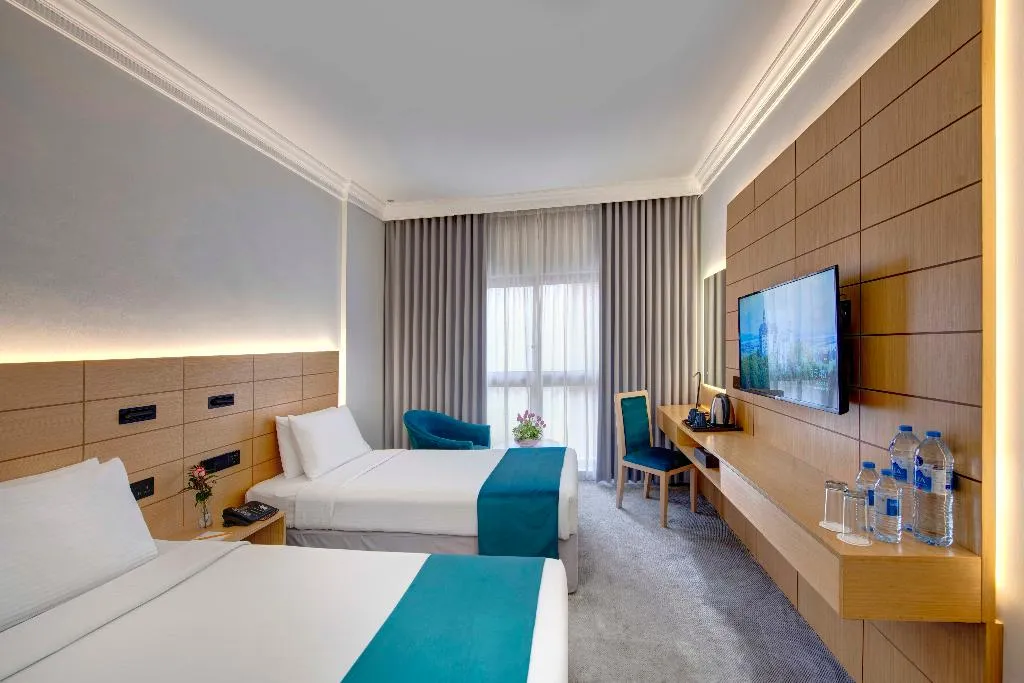 Double or Twin DELUXE Room, Lotus Grand Hotel Dubai, Dubai