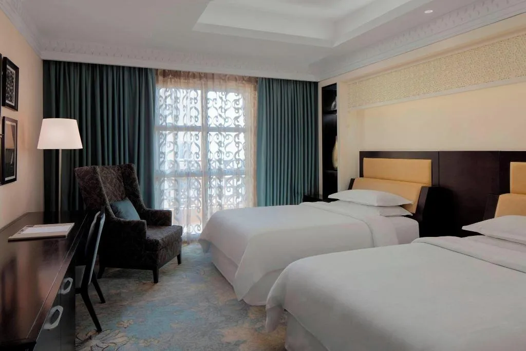 QUADRUPLE DELUXE TWO DOUBLE BEDS Room, Sheraton Sharjah Beach Resort & Spa, Dubai