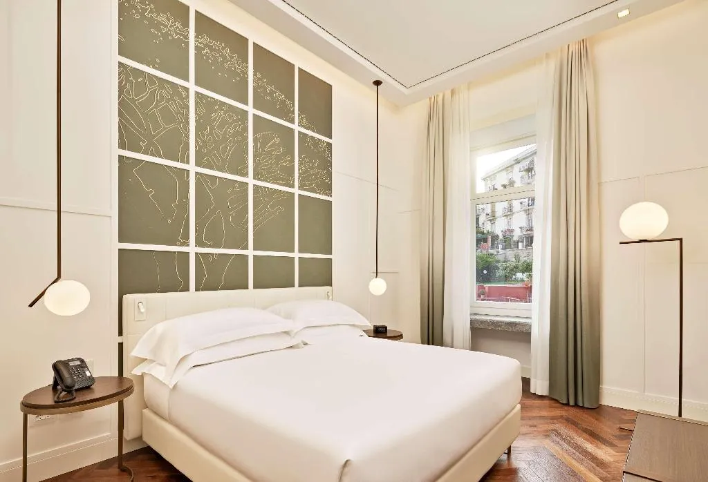 FAMILY ROOM STANDARD Room, de Bonart Naples-Curio Collection by Hilton, Naples