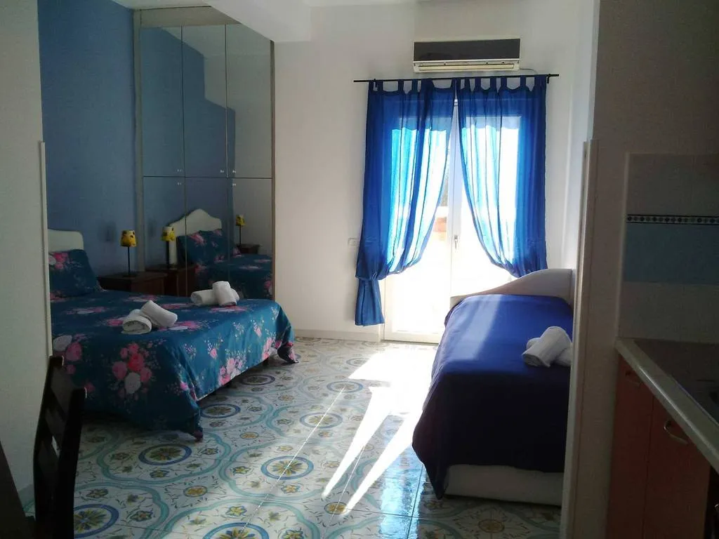 QUADRUPLE STANDARD Room, Sorrento Town Suites, Naples