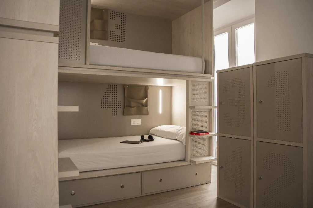Bed in dormitory FEMALE ROOM Room, Room Salvador, Seville