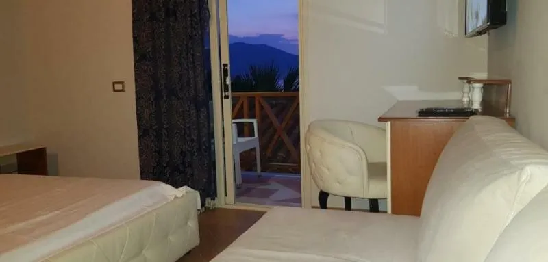 Room, Olympia Village, Kavaje