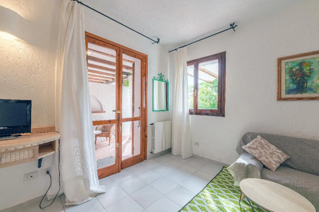 FAMILY ROOM TWO BEDROOMS TWO BATHROOMS Room, Punta Est, Olbia
