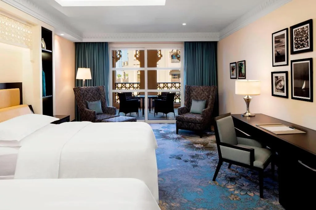 QUADRUPLE DELUXE TWO DOUBLE BEDS Room, Sheraton Sharjah Beach Resort & Spa, Dubai