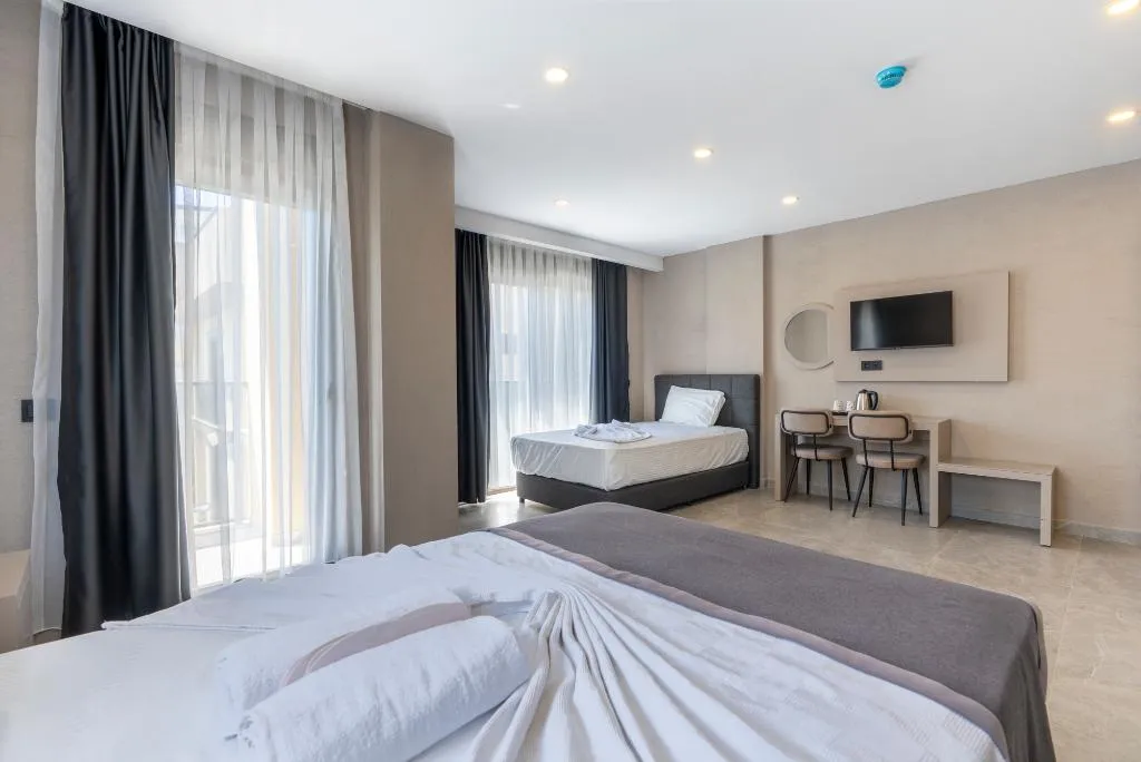 FAMILY ROOM CAPACITY 7 TWO BEDROOMS Room, Lara Beach Homes, Antalya