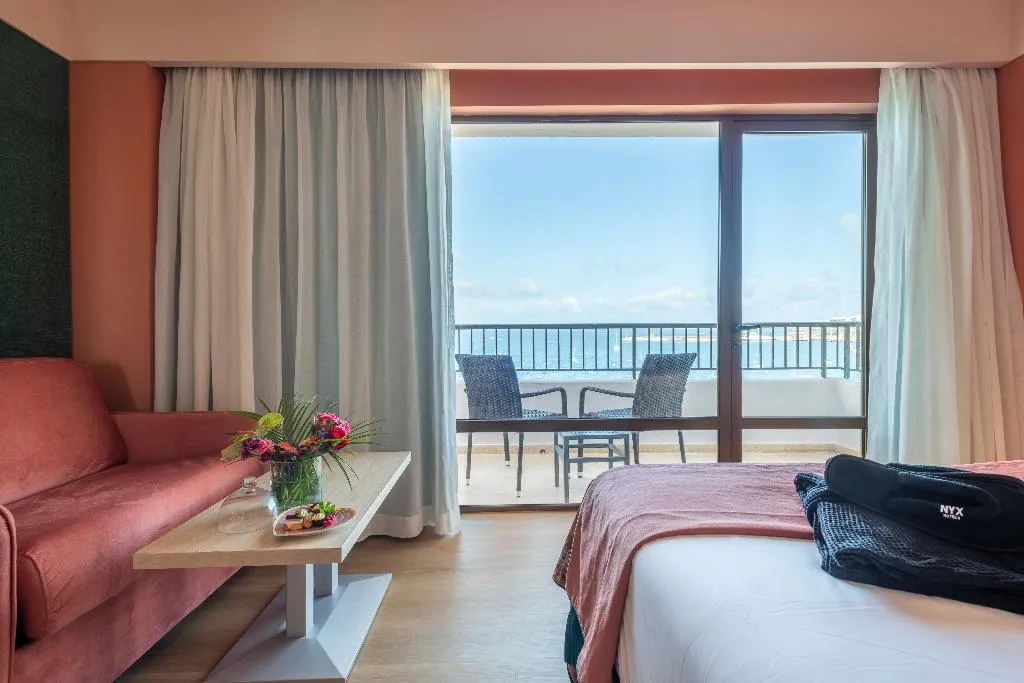 TRIPLE DELUXE SEA VIEW Room, NYX Hotel Ibiza - Adults only, Ibiza