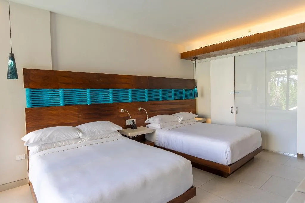 DOUBLE PARTIAL OCEAN VIEW TWO DOUBLE BEDS Room, Devossion by Live Aqua Playa del Carmen AI Only Ad, Playa Del Carmen