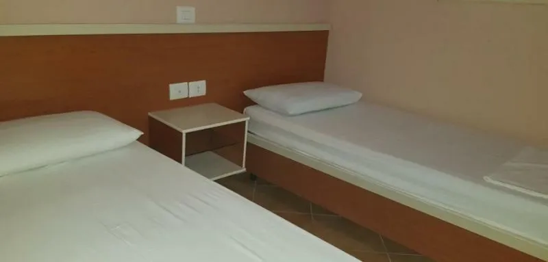 Room, Olympia Village, Kavaje