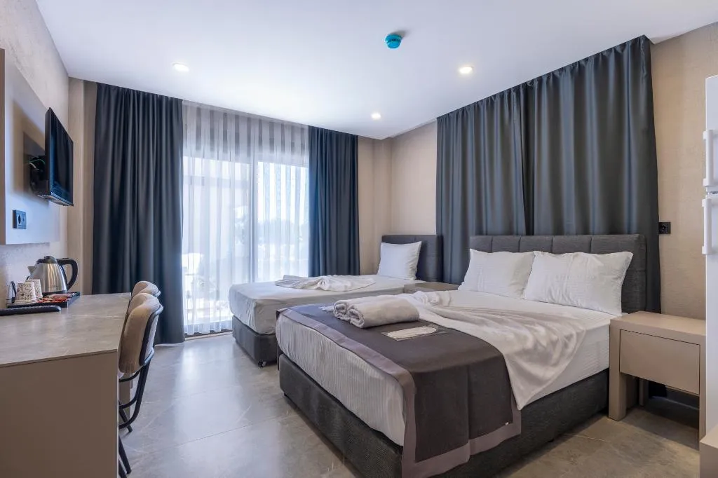 FAMILY ROOM CAPACITY 5 TWO BEDROOMS Room, Lara Beach Homes, Antalya