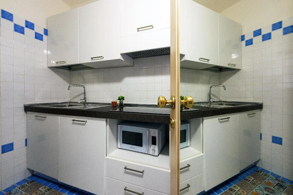 FAMILY ROOM TWO BEDROOMS TWO BATHROOMS Room, Punta Est, Olbia
